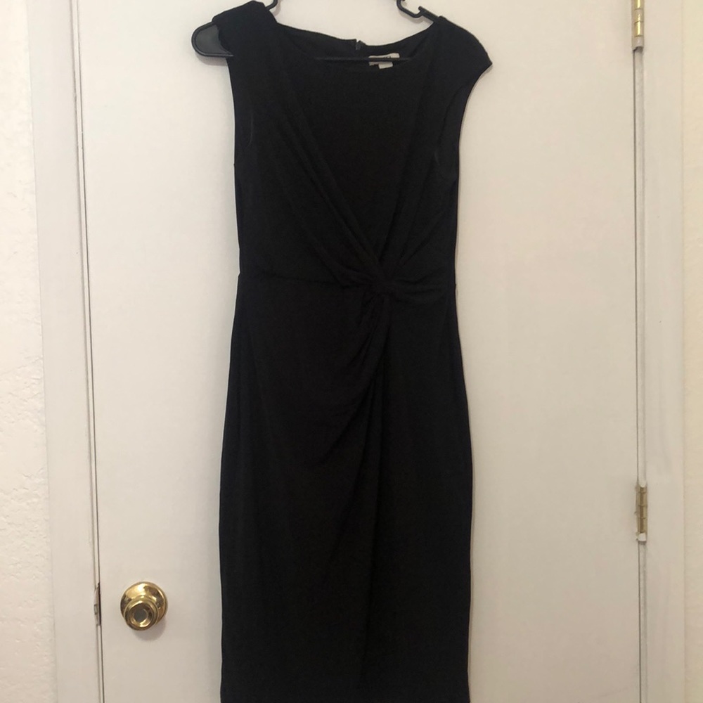 Cute Catos black with a cross cross knotting at side of dress. Fully lined.